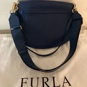 Furla | Bags | Furla Is A Medium Crossbody Bag Made Of  FURLA is a medium crossbody bag made of grained calfskin. main image 1